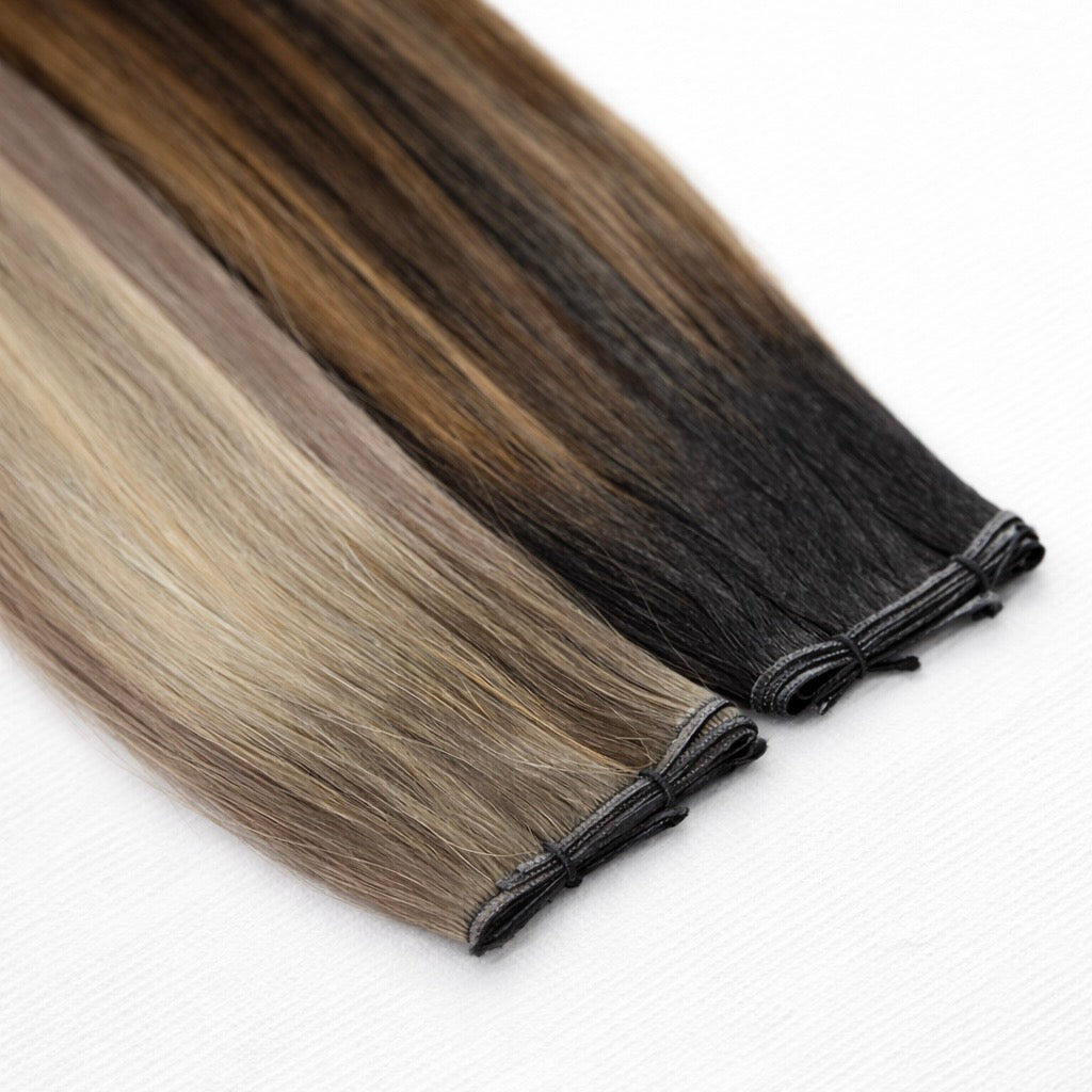 Remalisse genius weft close up product image, Remy hair extensions on a plain white background. 