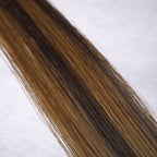 Studio Collection shade swatch in Espresso Twist #P2/6, featuring a dimensional blend of rich espresso brunette and warm chestnut brown tones with soft ribboned highlights, displayed with a smooth silky finish and natural shine.