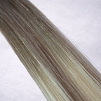 Studio Collection shade swatch in Hollywood Blonde #B7A/60, featuring a dimensional blend of cool mushroom blonde and creamy vanilla blonde tones with bright ribboned highlights, a silky finish, and natural shine.