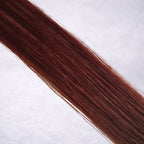 Luxury Remy human hair extension shade swatch in Mulberry #34 from the Remalisse Studio Collection, featuring a rich deep red tone with warm auburn undertones, soft dimension, a silky finish, and natural shine.