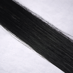 Luxury Remy human hair extension shade swatch in Obsidian #1, featuring a rich true black tone with a smooth silky finish and natural shine.
