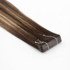Luxury Remy tape-in extensions - ultra-flat adhesive tab construction.
