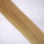 Luxury Remy human hair extension shade swatch in Soft Gold #16 from the Remalisse Studio Collection, featuring a warm blonde tone with soft golden undertones, natural dimension, a silky finish, and natural shine.