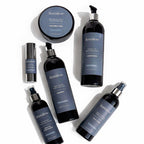 Remalisse hair extension aftercare range arranged on a white background including deep cleanse shampoo, smooth silk conditioner, rejuvenation mask, argan elixir oil serum, silk restore leave-in, shine + protect heat guard. 