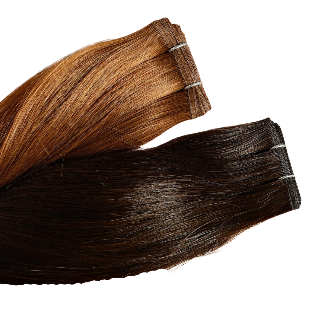 Close-up of Remalisse Studio Flat Weft hair extensions in brunette shades displayed on a white background, showing the seamless flat weft edge and smooth hair finish. 