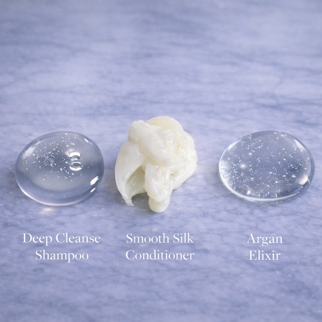 Hair Extension aftercare product textures including Remalisse Shampoo, conditioner and argan oil serum displayed on a marble surface 