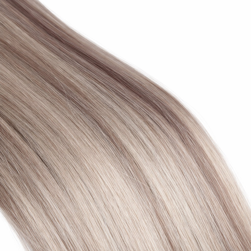 Close up of Remalisse Genius Weft hair texture showing smooth, silky strands and natural shine.