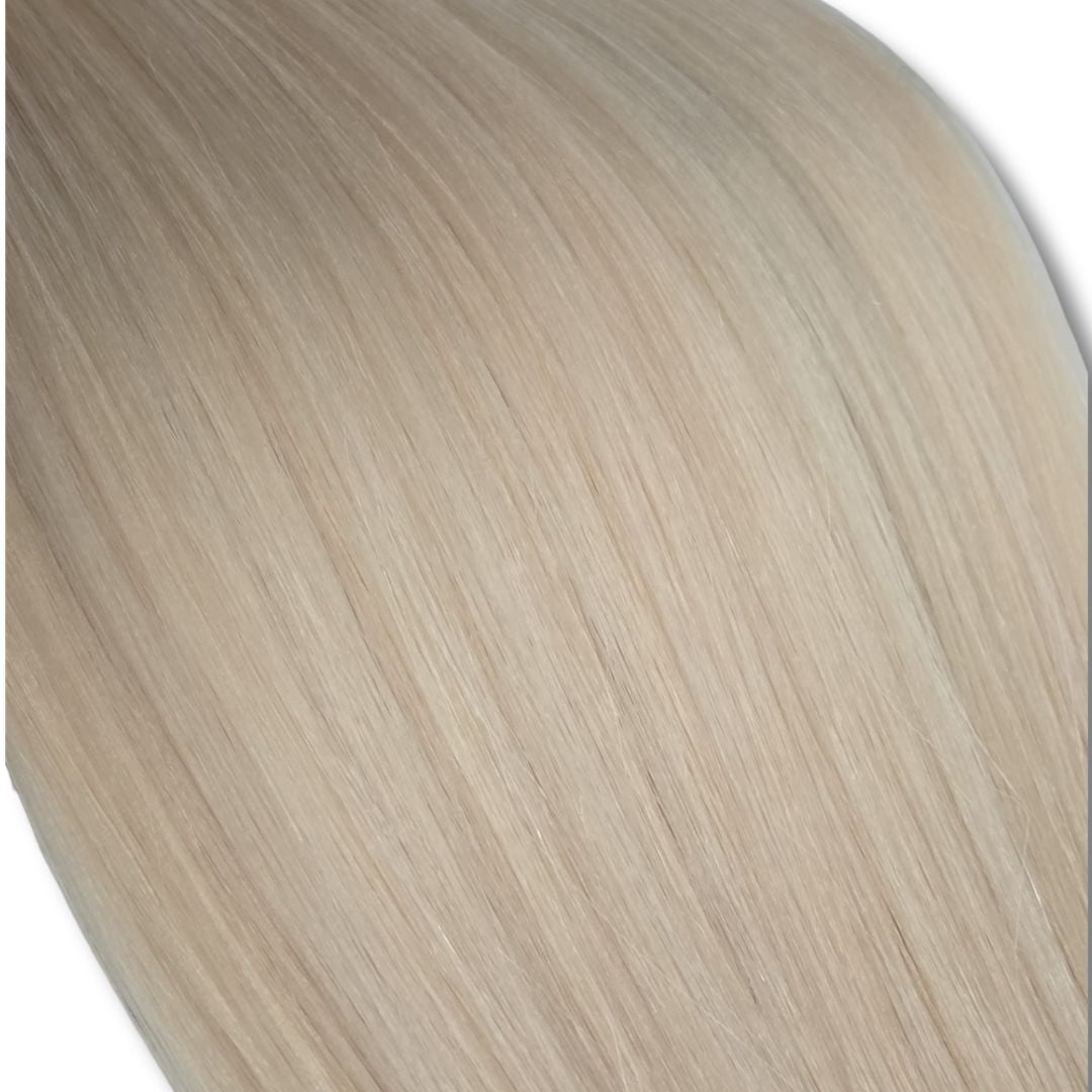 Remalisse Nano Tip Extensions - Detailed texture close-up showing smooth Remy human hair and natural shine. 