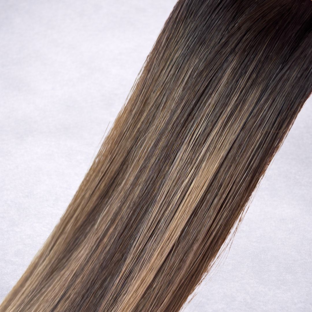 Remalisse Tape-In Hair Extensions- shade Caramel Waves Double drawn Remy human hair. 