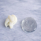 Remalisse Conditioner Cream and Clear Shampoo gel texture on marble background. 
