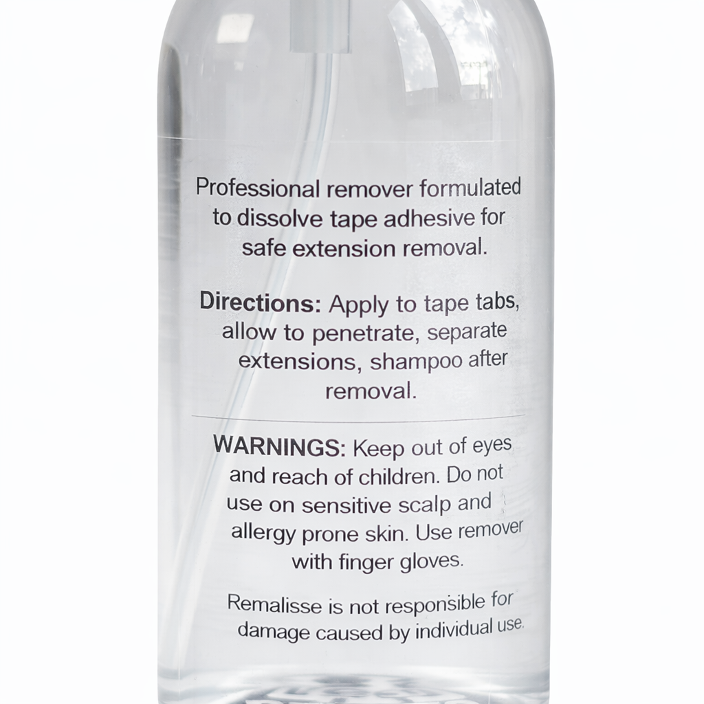 Close-up of Remalisse Tape Release extension remover back label showing directions, warnings, and product information on a clear bottle against a white background. 