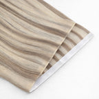 Remalisse Tape Weft Hair Extensions- Seamless Flat PU Weft in a Multi-Tonal Blonde blend close up.