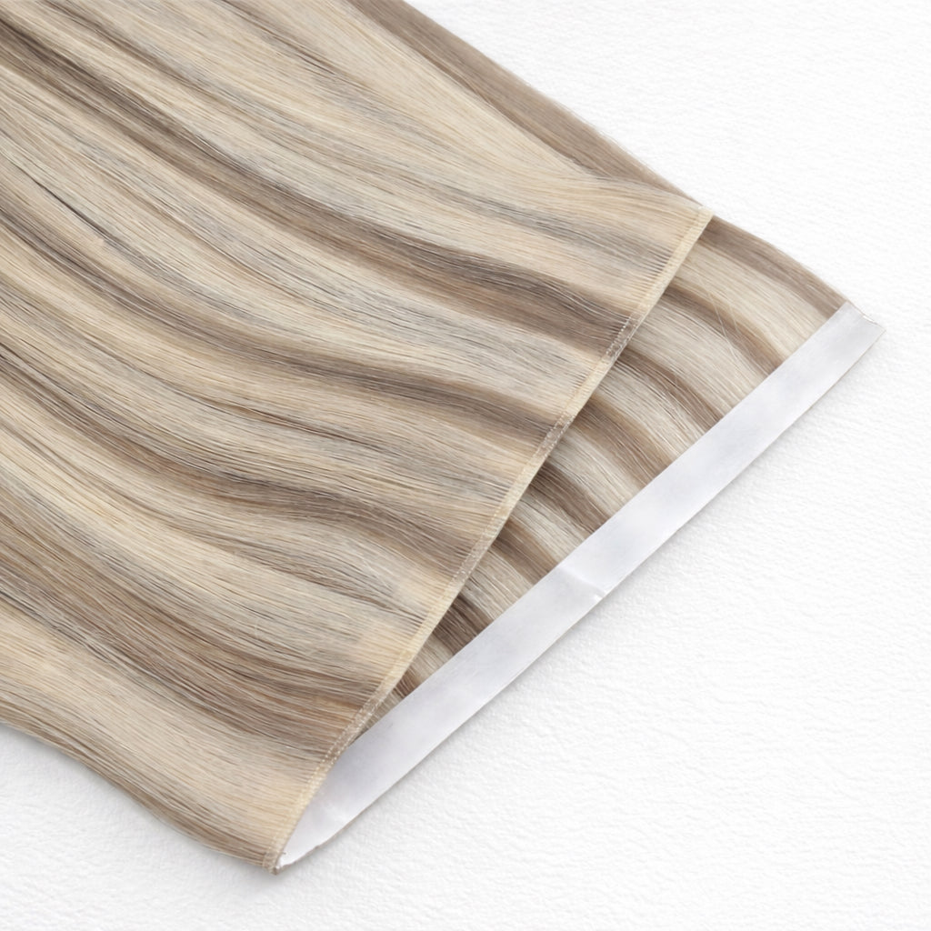 Remalisse Tape Weft Hair Extensions- Seamless Flat PU Weft in a Multi-Tonal Blonde blend close up.