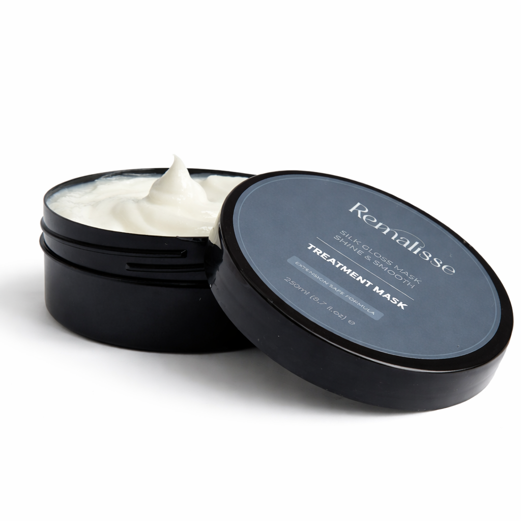 Remalisse Silk Gloss Mask - shine & Smooth treatment mask shown open with a smooth swirl of creamy white formula, alongside the lid, on a clean pure white background.