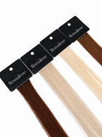 Remalisse Signature Collection hair colour swatches featuring luxury Remy human hair in brunette and blonde tones displayed on black branded swatch cards against a clean white background.